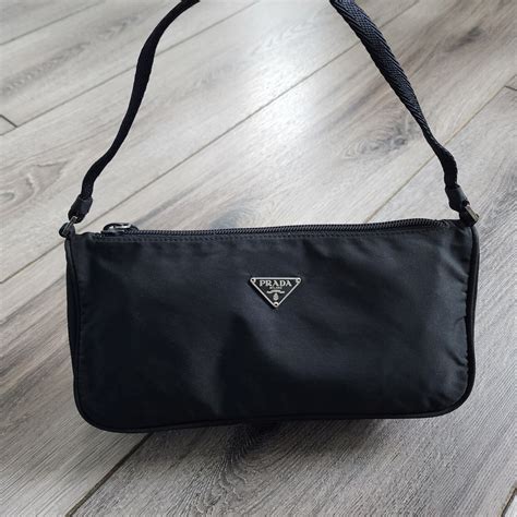 prada pochet|prada bag with small pouch.